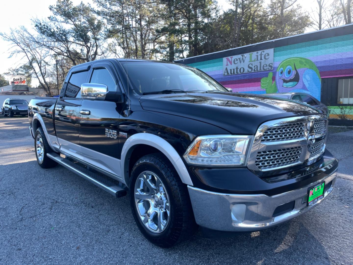 2014 BLACK RAM 1500 LARAMIE (1C6RR6VTXES) with an 5.7L engine, Automatic transmission, located at 5103 Dorchester Rd., Charleston, SC, 29418-5607, (843) 767-1122, 36.245171, -115.228050 - Photo#0